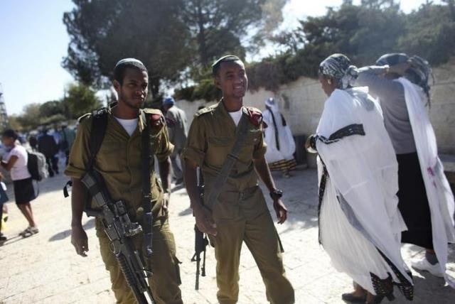 IDF soldiers take part in a ceremony marking the Ethiopian Jewish holiday of Sigd  (photo credit: REUTERS)