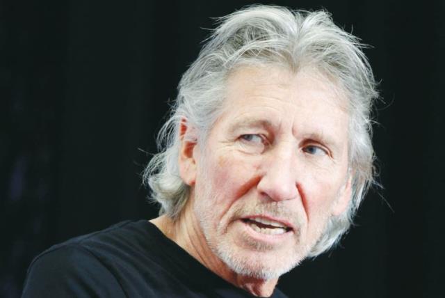 Former Pink Floyd leader Roger Waters speaks to the media in 2012. Some of his best friends are Jewish. (photo credit: CARLO ALLEGRI/REUTERS)
