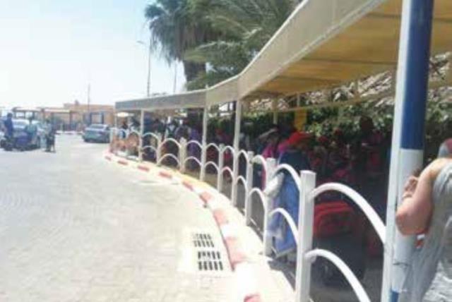 TOURISTS WAIT to enter Sinai at the Eilat-Taba border crossing (photo credit: LAURA KELLY)