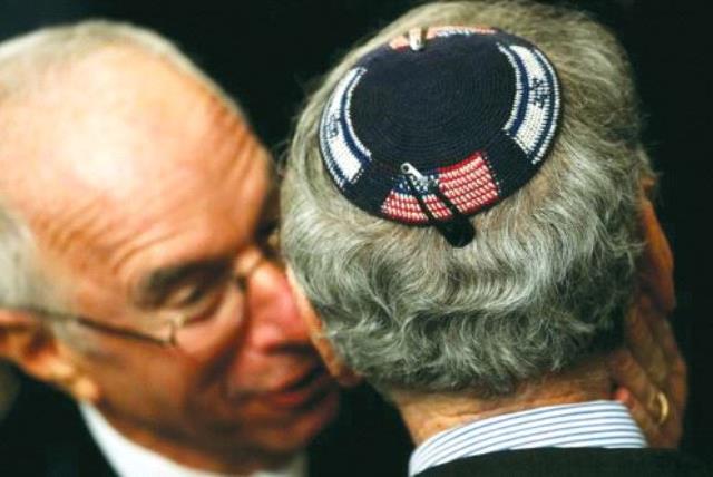 An American Jew wearing a kippa embroidered with the US and Israeli flags attends a Hanukka reception at the White House last year (photo credit: REUTERS)