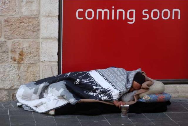Homeless person on Jaffa Street in Jerusalem. (photo credit: MARC ISRAEL SELLEM/THE JERUSALEM POST)