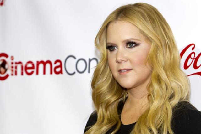 Actress Amy Schumer poses during the CinemaCon Big Screen Achievement Awards at Caesars Palace in Las Vegas (photo credit: REUTERS)